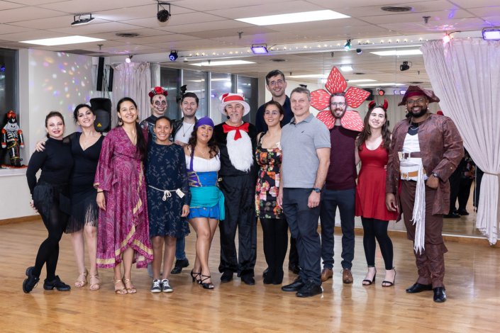 Halloween Dance Social 2025 at Dancingland Dance Studio in North York, Toronto — a night of ballroom and Latin dance, creative costumes, and pure joy. Dancers in vibrant outfits including pirates, gypsies, skeleton ballerinas, and the Cat in the Hat filled the studio with energy, laughter, and movement. The glowing lights, colorful décor, and smiling faces captured the spirit of Dancingland — connection, confidence, and community through dance. Each photo tells the story of rhythm, elegance, and togetherness on the dance floor at Toronto’s most welcoming ballroom and Latin dance studio.